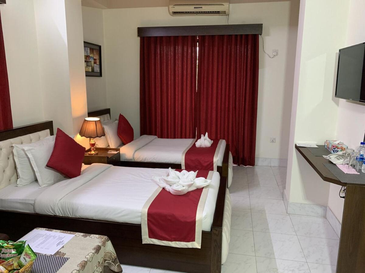 Outer Circle Inn Dhaka Extérieur photo